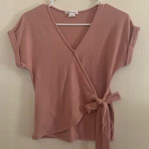 Wrap style top with bow